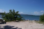 Photo: Buttonwood: Gravel site, rip rap, water and old Bahia Honda Bridge in the background.