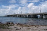 Photo: Buttonwood: Gravel, rip rap, water and new Bahia Honda Bridge in the background.