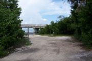 Photo: Buttonwood: Gravel site, water and new Bahia Honda Bridge in the background.