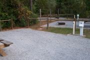 View of the back of the campsite with water and electric.