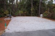 A view of the campsite with a shell/sand base.
