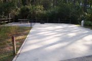 ADA-accessible campsite with concrete pad.