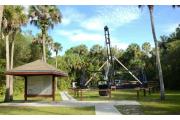 Barron Gift Collier Memorial Field:  The white marble columns on a large grassy open field are a memorial to Barron Gift Collier who set aside the property for a park, which is now Collier-Seminole State Park.