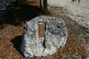 Photo: 011, JOHN PENNEKAMP CORAL REEF SP. Rock with white campsite number and white arrows pointing to site on brown metal plate.