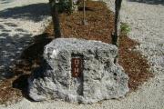 Photo: 013, JOHN PENNEKAMP CORAL REEF SP. Rock with white campsite number and white arrows pointing to site on brown metal plate.