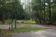Pull through campsite with water, electric and picnic table.