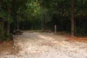 Deep campsite with picnic table with water and electricity.