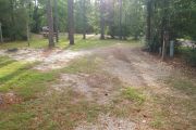 Pull through campsite with water and electric hook ups.