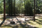 Pull through campsite with water, electric and picnic table.