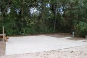 This site is equipped with a large ADA concrete pad for easy access for hook up and pull in.