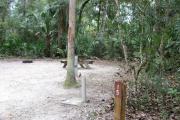 Each site is equipped with a picnic table, clothesline/lantern post, hose bib, electric hook-up for 20 and 50 amp service, and fire pit on the ground with a fold over grill top.