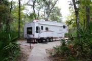 This site is equipped with a large ADA concrete pad for easy access for hook up and pull in.