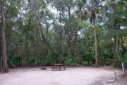 Each site is equipped with a picnic table, clothesline/lantern post, hose bib, electric hook-up for 20 and 50 amp service, and fire pit on the ground with a fold over grill top.
