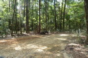 Campsite with water, electric and picnic table.
