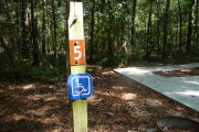 ADA-Accessible site with concrete pad and ground grill. RVs only.