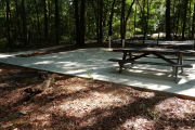 ADA-Accessible site with concrete pad, picnic table and ground grill. RVs only.