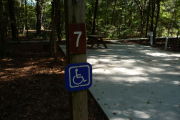 ADA-Accessible site with concrete pad and ground grill. RVs only.