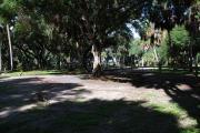 This is a picture of campsite 1 from the back of the site looking toward the road.   The site has water and 50amp electric service.  This is a partly sunny site with a gravel foundation.  The site has a picnic table and a ground campfire ring.
