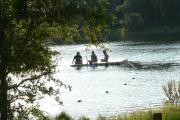 Children relax while swimming in Lake Osprey.