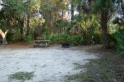 View of picnic table and grill