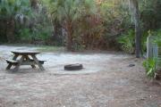 View of picnic table and grill