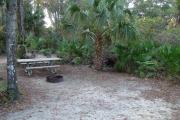 View of picnic table and grill