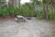 View of picnic table and grill