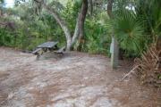 View looking at table, utilities, and creek