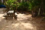 View of picnic table and grill