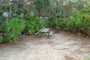 View of picnic table and grill