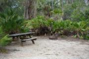 View of picnic table and grill