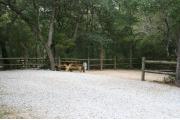 32 foot back in site surrounded by beautiful trees and split rail fencing.