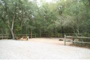 32 foot back in site surrounded by beautiful trees and split rail fencing.