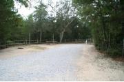 40 foot back in site surrounded by beautiful trees and split rail fencing.