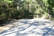 30 foot back in site surrounded by beautiful trees and split rail fencing.