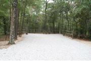 40 foot back in site surrounded by beautiful trees and split rail fencing.