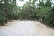 40 foot back in site surrounded by beautiful trees and split rail fencing.
