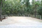 36 foot back in site surrounded by beautiful trees and split rail fencing.