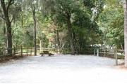 36 foot back in site surrounded by beautiful trees and split rail fencing.