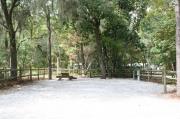 36 foot back in site surrounded by beautiful trees and split rail fencing.