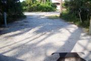 View from the front showing the path to the bathhouse across the street from the site.
