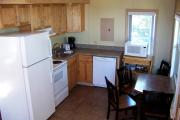 Kitchen with stove, refrigerator, dishwasher