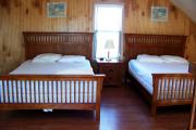 Bedroom loft with 2 full size beds, dresser