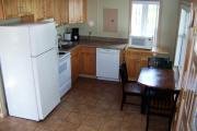 Kitchen with stove, refrigerator, dishwasher