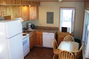 Kitchen with stove, refrigerator, dishwasher