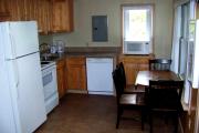 Kitchen with stove, refrigerator, dishwasher