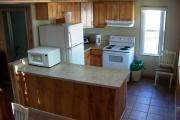 Kitchen with stove, refrigerator, dishwasher