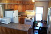 Kitchen with stove, refrigerator, dishwasher