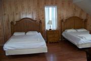 Bedroom loft with 2 full size beds, dresser