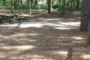 This site includes water, septic, and electric.  Accommodates tents, pop ups and RV's.